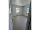 Bright bedroom with large windows and neutral walls at 2508 50Th N Ave, St Petersburg, FL 33714