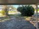 View from under carport, showing yard and street at 2508 50Th N Ave, St Petersburg, FL 33714