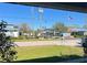 View of a community with several buildings, parking, and landscaping at 2508 50Th N Ave, St Petersburg, FL 33714