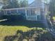 Front view of a charming small cottage with green accents at 2508 50Th N Ave, St Petersburg, FL 33714