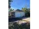 Detached two-car garage with a large driveway at 2508 50Th N Ave, St Petersburg, FL 33714