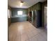 Kitchen with green cabinets, stainless steel appliances, and tiled floors at 2508 50Th N Ave, St Petersburg, FL 33714