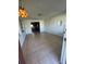 Living room with tiled floors and view into kitchen at 2508 50Th N Ave, St Petersburg, FL 33714