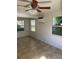 Living room with tile floors, windows and ceiling fan at 2508 50Th N Ave, St Petersburg, FL 33714