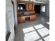 Sunroom with built-in cabinets and tile floor at 2508 50Th N Ave, St Petersburg, FL 33714