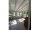 Sunroom features ample natural light and tile floors at 2508 50Th N Ave, St Petersburg, FL 33714