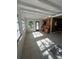 Spacious sunroom with built-ins and tile floor at 2508 50Th N Ave, St Petersburg, FL 33714