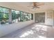 Bright sunroom with multiple windows and carpeted floor at 2869 Catherine Dr, Clearwater, FL 33759