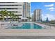 Rooftop pool deck with lounge chairs and umbrellas provides a relaxing outdoor space at 301 1St S St # 1005, St Petersburg, FL 33701