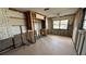 A gutted bedroom ready for renovation, featuring exposed framing and new construction potential at 5641 1St Ne St, St Petersburg, FL 33703