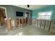 A bedroom with exposed framing and walls, ready for a total renovation at 5641 1St Ne St, St Petersburg, FL 33703