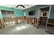 A bedroom undergoing complete renovation, showing exposed walls and plumbing at 5641 1St Ne St, St Petersburg, FL 33703