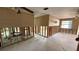 An open living area undergoing a complete renovation, showcasing exposed walls and flooring at 5641 1St Ne St, St Petersburg, FL 33703