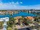 Waterfront home, lush landscaping, and stunning water views at 6015 Kipps Colony E Dr, Gulfport, FL 33707
