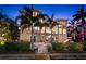 This canal-front home features an inviting outdoor space with a patio and dock at 6015 Kipps Colony E Dr, Gulfport, FL 33707