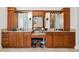Bathroom with dual vanities, granite countertop and lots of cabinet space at 6015 Kipps Colony E Dr, Gulfport, FL 33707
