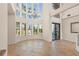 Bright entryway with stained glass windows and a chandelier, welcoming guests with an artistic ambiance at 6015 Kipps Colony E Dr, Gulfport, FL 33707