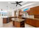 Well-appointed kitchen boasting custom cabinetry, tile floors, and modern appliances at 6015 Kipps Colony E Dr, Gulfport, FL 33707