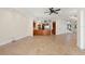 An open living space showcases the kitchen and staircase, creating a flowing environment for modern living at 6015 Kipps Colony E Dr, Gulfport, FL 33707