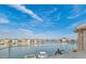 Scenic waterfront view from the balcony overlooking the water, boats, and neighborhood at 6015 Kipps Colony E Dr, Gulfport, FL 33707
