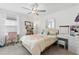 Charming bedroom with a vanity and ceiling fan at 8280 Rolling Tides Dr, New Port Richey, FL 34655