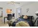Modern bedroom with a desk and a ceiling fan at 8280 Rolling Tides Dr, New Port Richey, FL 34655