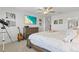 Bright bedroom featuring a comfortable bed and decorative accents at 8280 Rolling Tides Dr, New Port Richey, FL 34655
