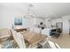 Dining room with wooden table and chandelier at 8280 Rolling Tides Dr, New Port Richey, FL 34655