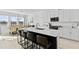 Open kitchen boasts an island and breakfast bar at 8280 Rolling Tides Dr, New Port Richey, FL 34655