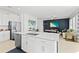 Open concept kitchen with island and stainless steel appliances at 8280 Rolling Tides Dr, New Port Richey, FL 34655