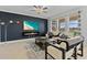 Living room with fireplace, large windows, and comfortable seating at 8280 Rolling Tides Dr, New Port Richey, FL 34655