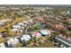Wide aerial view of the condo and surroundings at 9386 Tradewinds Ave, Seminole, FL 33776