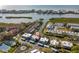 Wide aerial view of condo, marina, and city at 9386 Tradewinds Ave, Seminole, FL 33776