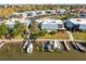 Aerial view of condo building and marina at 9386 Tradewinds Ave, Seminole, FL 33776