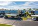Complex with covered parking and lush landscaping at 9386 Tradewinds Ave, Seminole, FL 33776