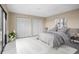 Spacious bedroom with large closets and balcony access at 9386 Tradewinds Ave, Seminole, FL 33776