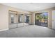 Spacious bedroom with mirrored closet doors and private balcony at 9386 Tradewinds Ave, Seminole, FL 33776