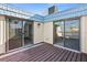 Private deck with access from multiple rooms and water views at 9386 Tradewinds Ave, Seminole, FL 33776