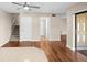 Hallway view with stairs, bathroom, and exterior access at 9386 Tradewinds Ave, Seminole, FL 33776