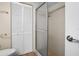 Large walk-in shower with glass door at 9386 Tradewinds Ave, Seminole, FL 33776