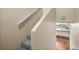 Carpeted stairs offering a view of the kitchen at 9386 Tradewinds Ave, Seminole, FL 33776