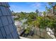 Scenic view of the canal and boats from private deck at 9386 Tradewinds Ave, Seminole, FL 33776