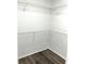 Corner closet with wire shelving at 9738 Lake Chase Island Way, Tampa, FL 33626