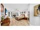 Bright bedroom featuring wood-look floors, neutral walls, and a ceiling fan at 1957 Whitney Oaks Blvd, Clearwater, FL 33760