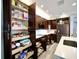 Kitchen pantry has pull out shelving offering organized storage solutions at 1957 Whitney Oaks Blvd, Clearwater, FL 33760