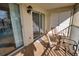 Relaxing screened porch with scenic views and seating for enjoying the outdoors and lake views at 201 Silver Lake Dr # 204, Venice, FL 34292