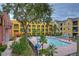Resort-style pool with surrounding patio and seating at 2010 E Palm Ave # 14215, Tampa, FL 33605