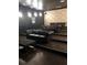 Community theater with tiered seating and leather couches at 2010 E Palm Ave # 14215, Tampa, FL 33605