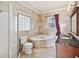 Bathroom featuring a corner jacuzzi tub, shower, and granite vanity at 2201 30Th N Ave, St Petersburg, FL 33713
