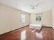 Bright bedroom with wood floors and a ceiling fan at 2201 30Th N Ave, St Petersburg, FL 33713